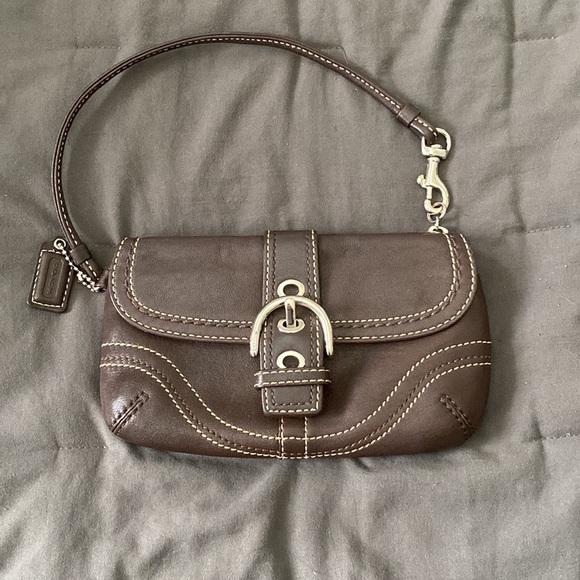 Coach Handbags - Coach Soho buckle flap brown leather hand bag 1489
